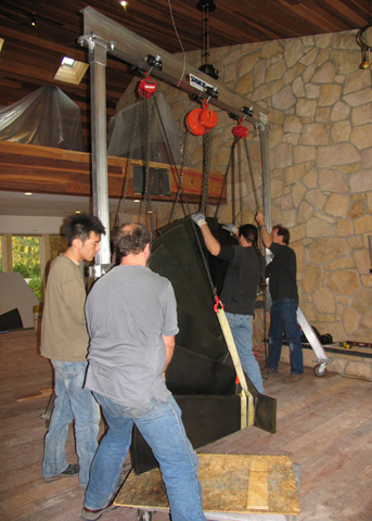 Wrangling the stair into position.